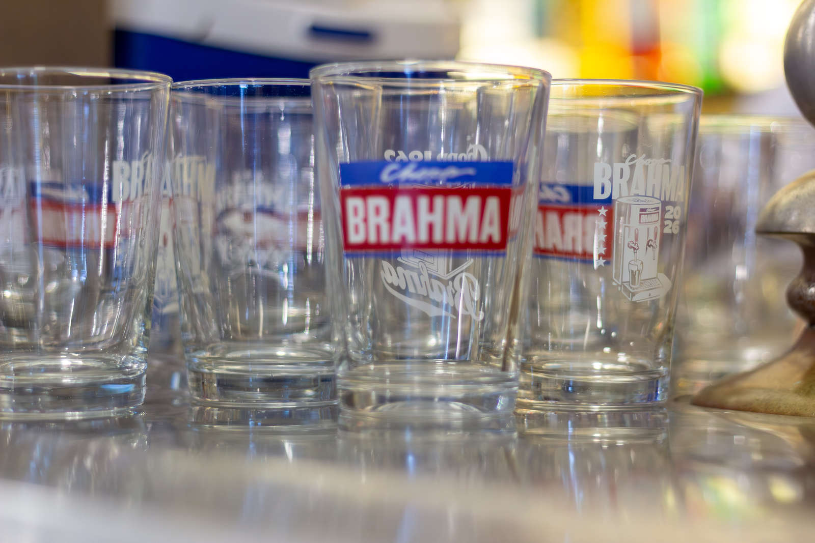 Brahma glasses beside the historic beer tap at Bar Brasil