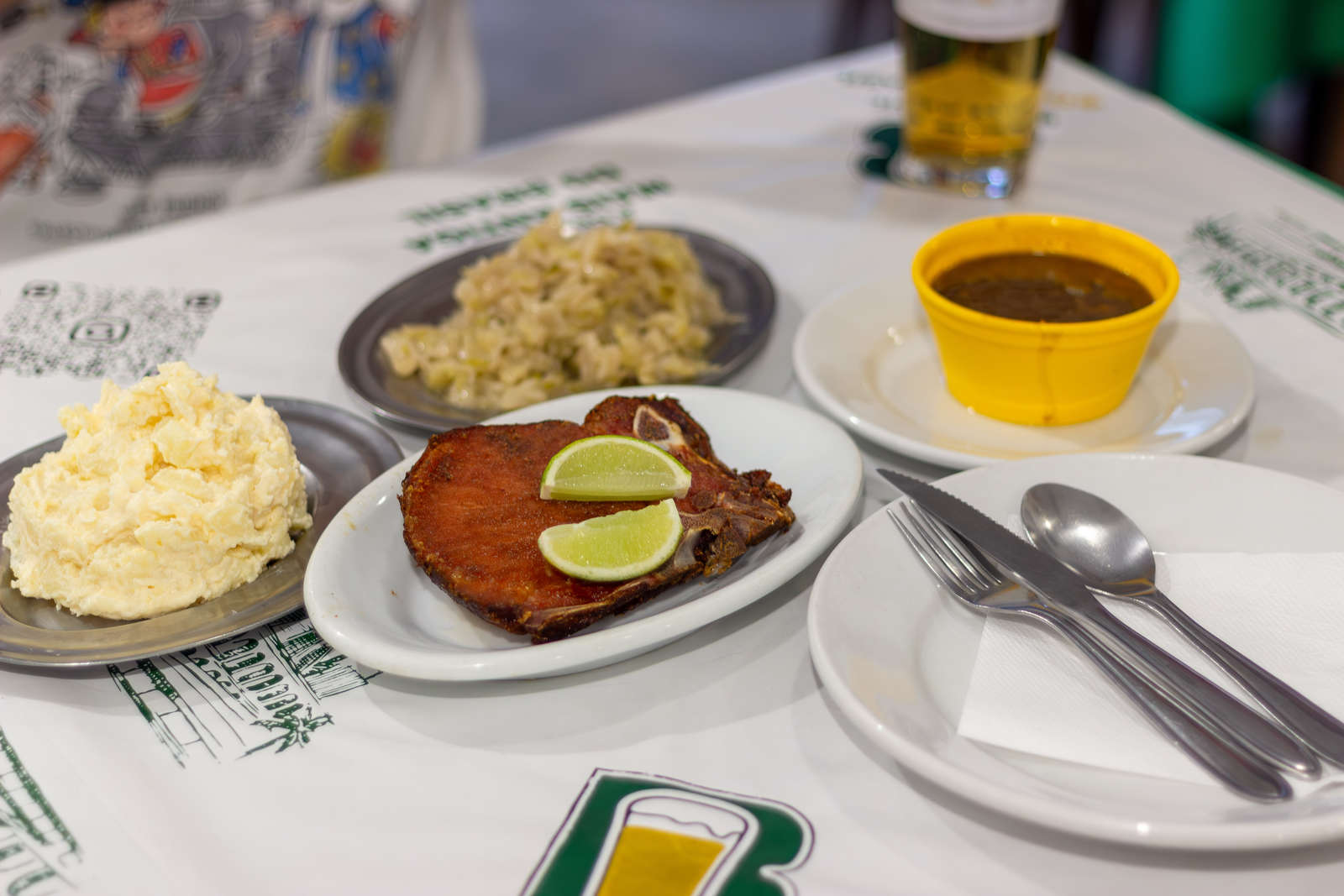 Smoked kassler with potato salad, cabbage, and lentils at Bar Brasil