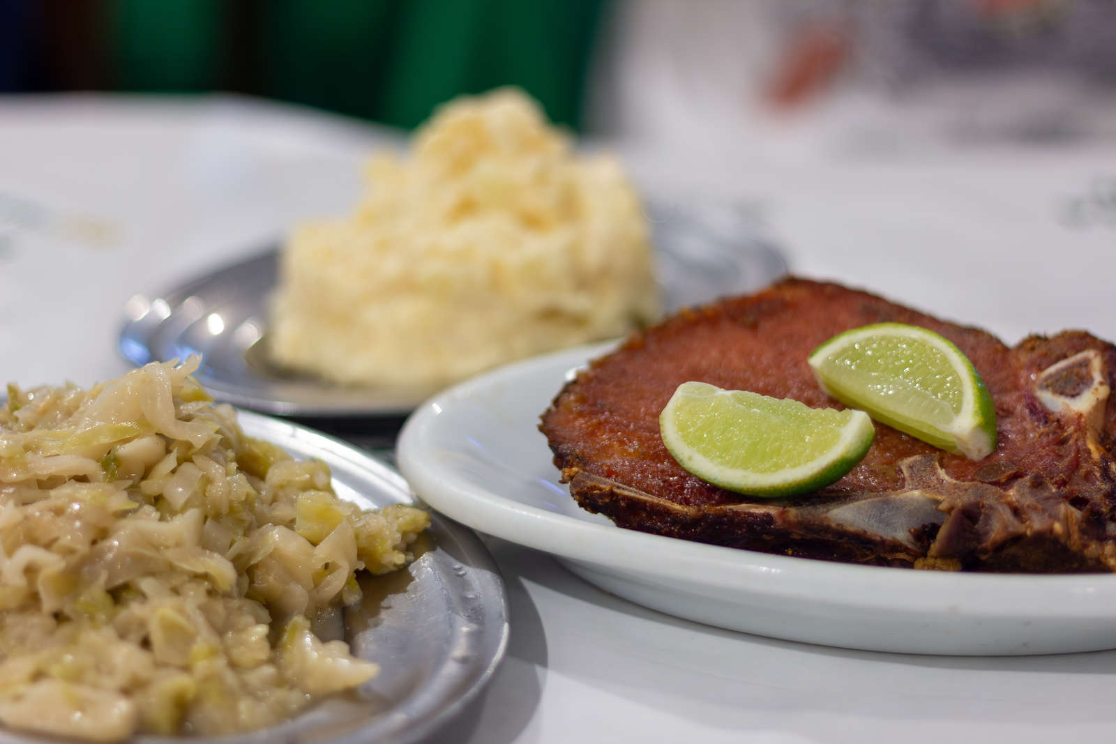 Smoked kassler with lime and side dishes at Bar Brasil