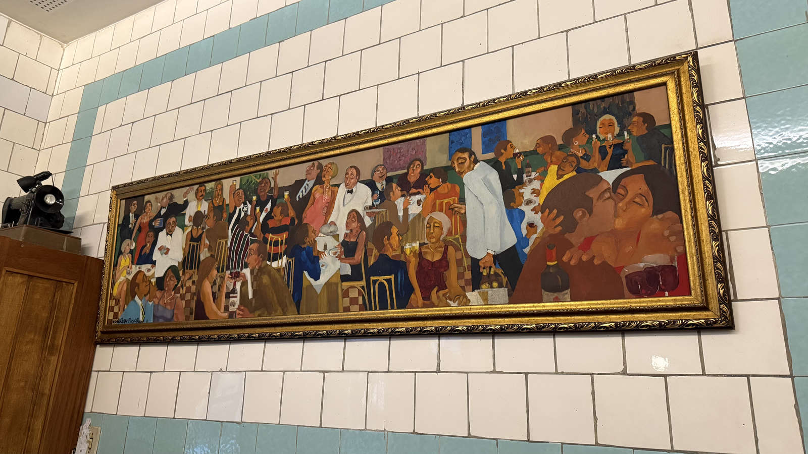 A restaurant scene painted on the historic tiles at Casa Urich