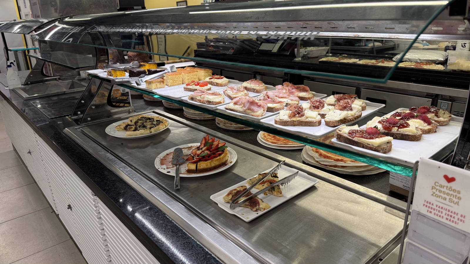 A display of prepared dishes at a Zona Sul supermarket