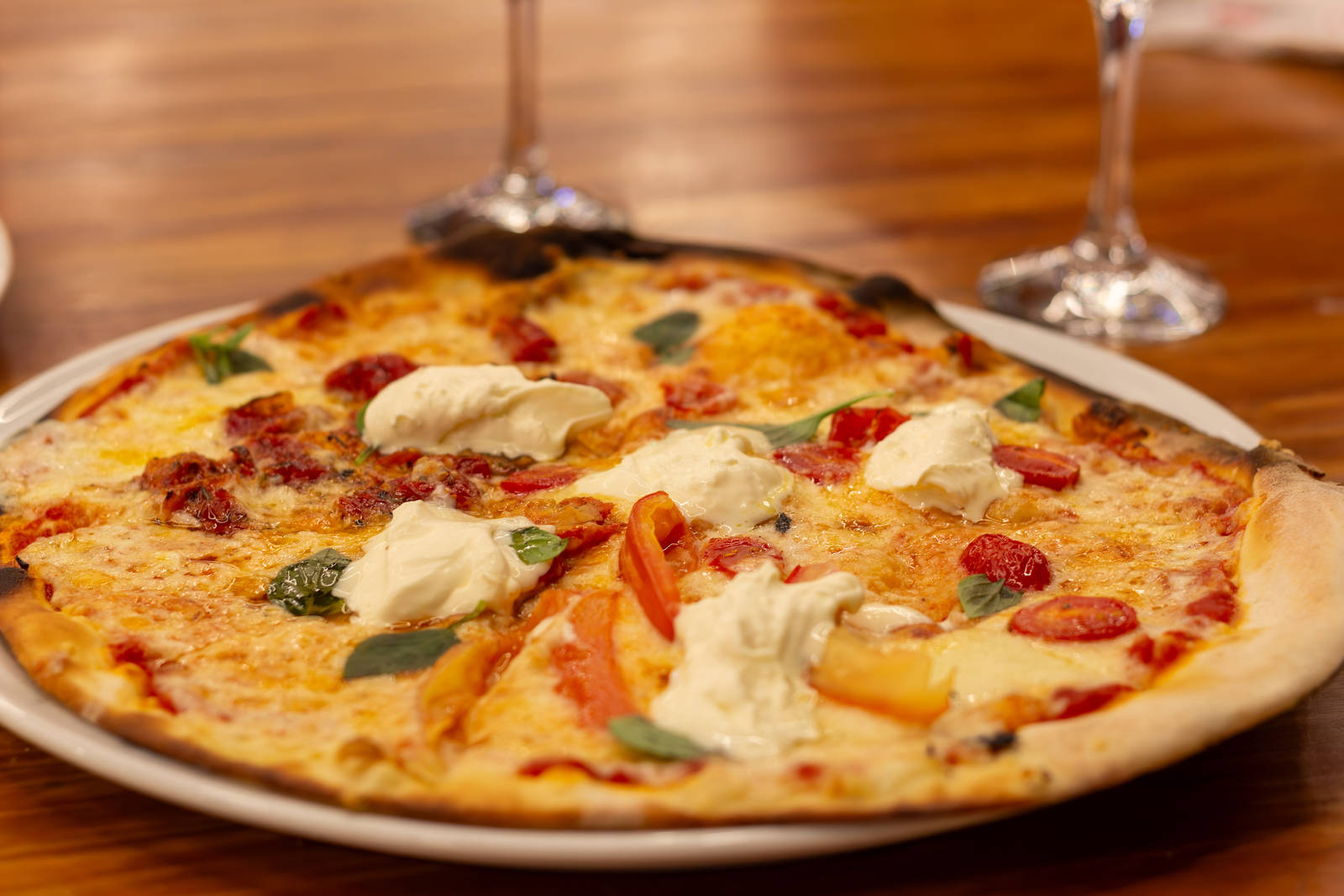 Stracciadoro pizza with stracciatella and tomatoes at Zona Sul