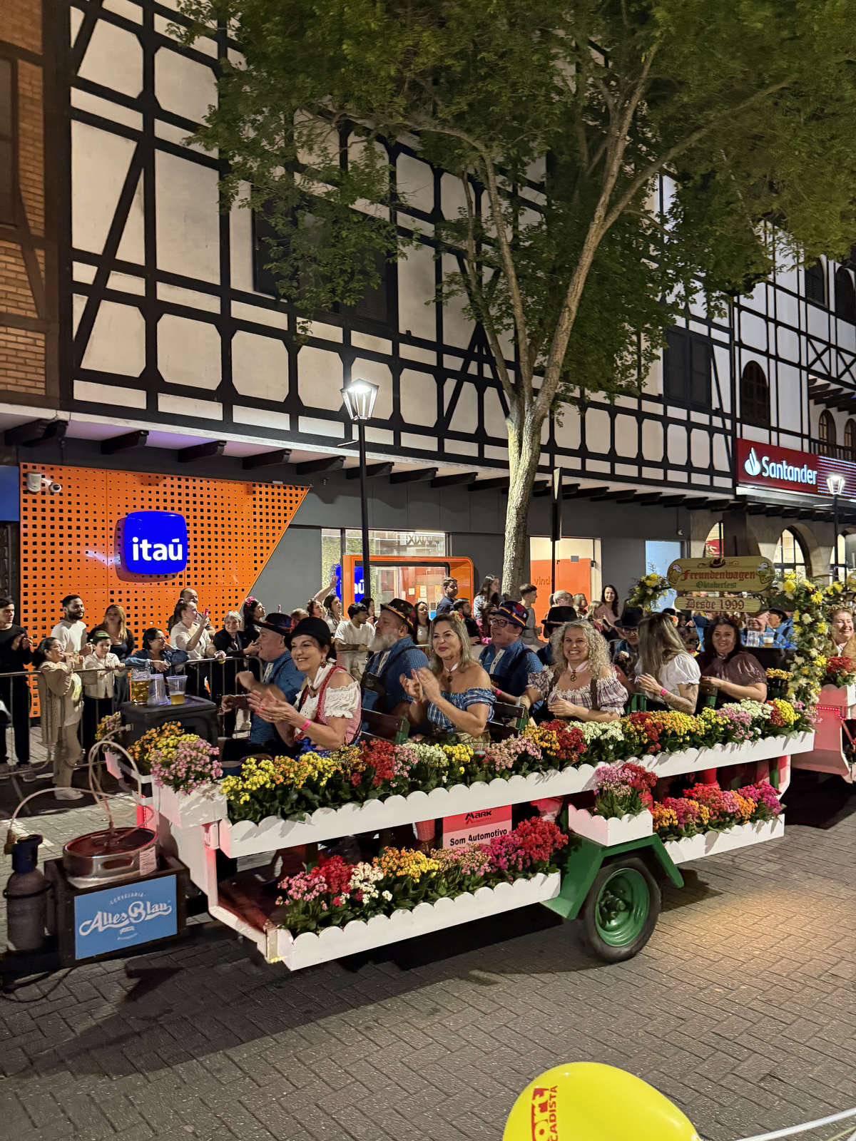 A flower-covered float in the Oktoberfest Blumenau parade