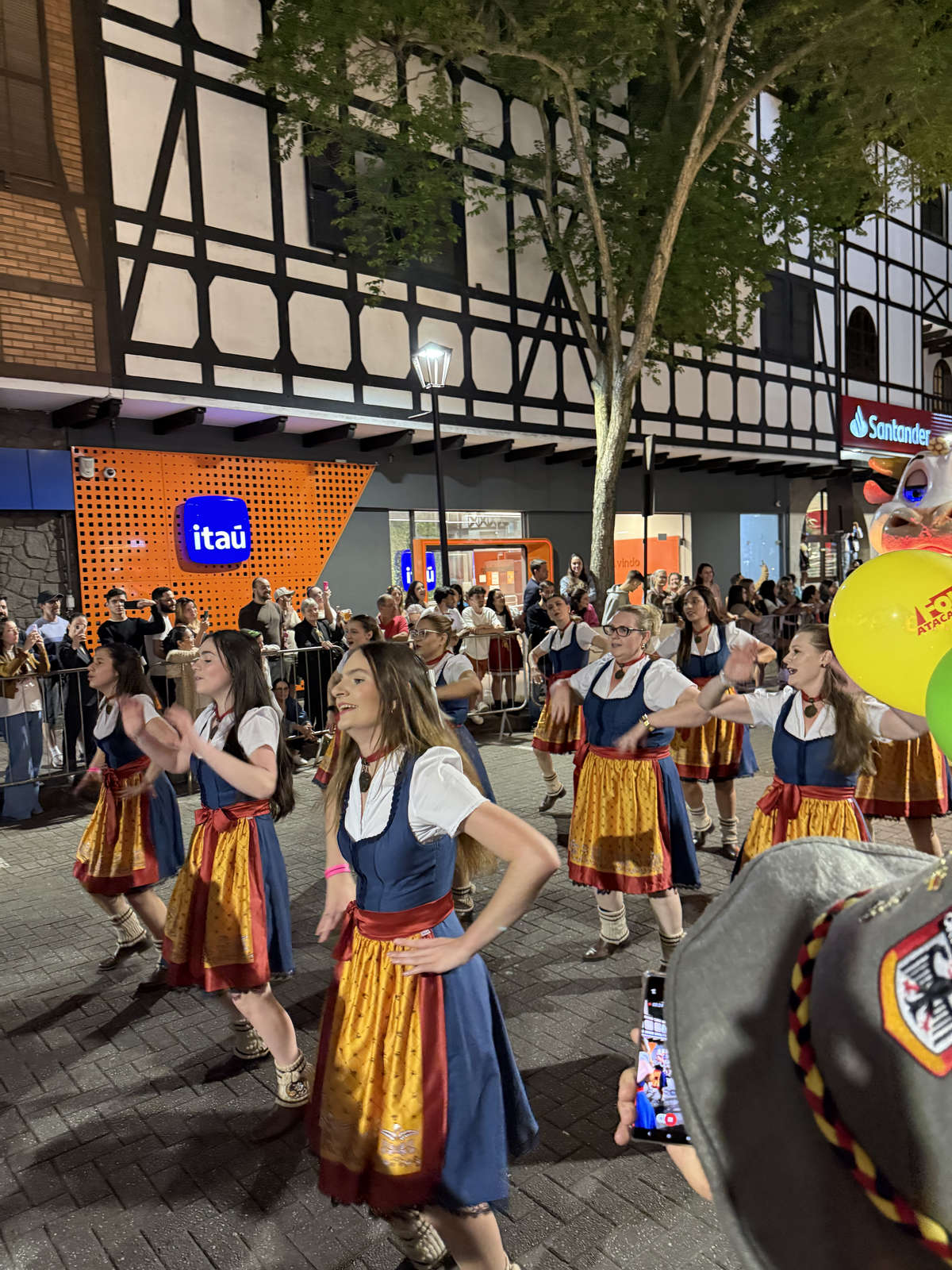 Members of a folk group in traditional dress in the Oktoberfest Blumenau parade