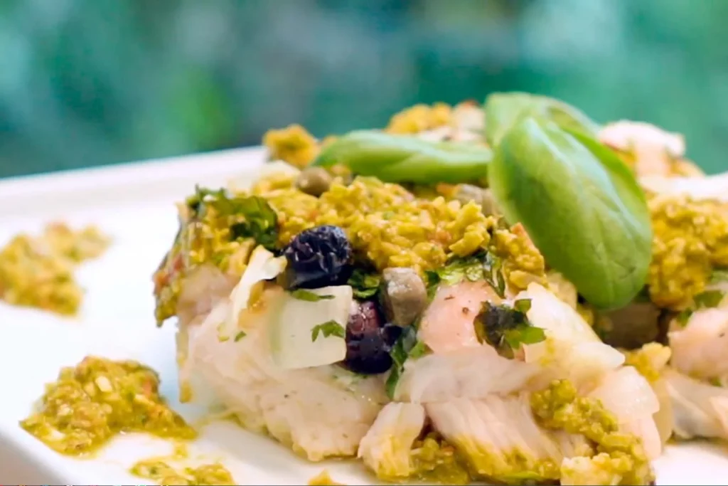 Pirarucu fillet dish with vegetables and sauce